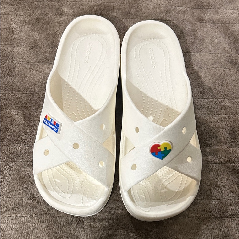 CROCS Women’s White Sandals with 2 autism awareness jibbitz.